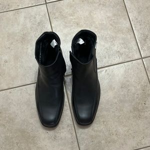 Brand new, black leather dress boots